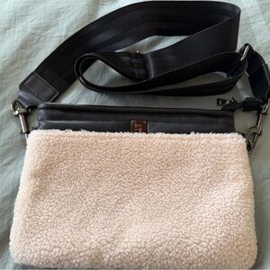 Think Royln Bum Bag in a white sherpa material with a black adjustable strap